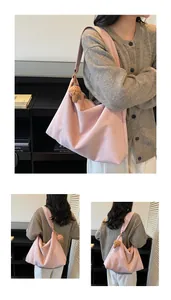 Detailed view of the large pink tote bag with a decorative crochet ice cream pendant