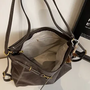 Retro deep brown large tote bag with contrast stitching and vintage leather texture