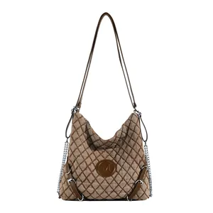 Minimalist brown quilted underarm tote bag with diamond texture and adjustable strap