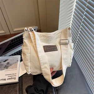 Minimalist Canvas Shoulder Bag For Women Streetwear Crossbody Bag With Adjustable Wide Strap And Leather Patch Messenger Bag
