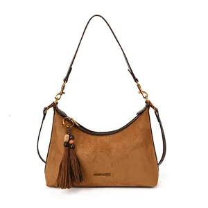 Retro brown suede dumpling handbag with fringe tassel and gold hardware for women