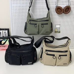 Nylon crossbody shoulder bags in army green, black and khaki with multi-pocket design