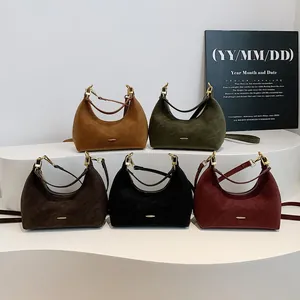 Hobo shoulder bag set in suede texture featuring five vintage colors and gold hardware