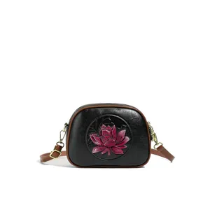 Retro Boston bag with 3D lotus embroidery on black leather and brown strap