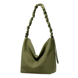 Olive green minimalist hobo bag with unique pleated scrunchie shoulder strap design
