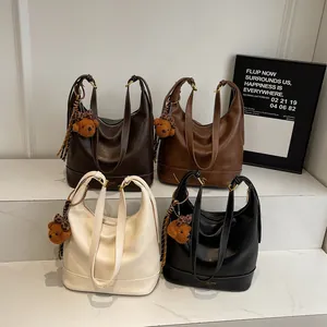 Minimalist soft leather large tote bags with bear charms in four assorted colors