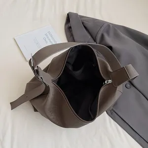 Classic dark brown PU leather tote bag with spacious interior and zipper closure