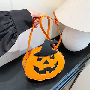 Halloween pumpkin shoulder bag with wizard hat decor and orange PU leather finish