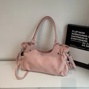 Bolso tote rosa minimalista con cordón ajustable y correa de hombro desmontable