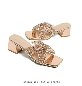 Detail of rose gold square toe platform sandals with beaded straps and chunky heels