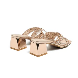 Women's rose gold platform sandals with rhinestone straps and mirror finish block heels