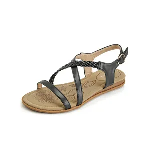 Bohemian black flat sandals with sunflower print insole and braided strap detail