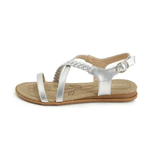 Bohemian women's silver flat sandals with woven metallic straps and adjustable buckle