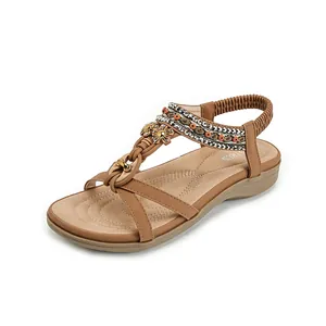 Sandales compensées marron pour femme style bohème avec lanières perlées et fleurs en métal