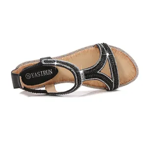 Sandali bassi bohémien neri da donna con strass scintillanti e cinturino elastico sul tallone