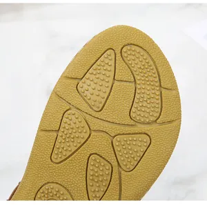 Detailed macro view of slip-resistant rubber sole with dense anti-skid grain texture
