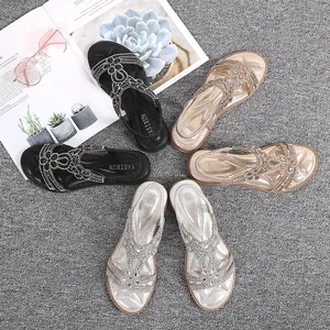 Women's Bohemian flat thong sandals with rhinestones and beads in black, gold, and silver