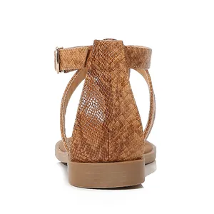 Close-up back view of women's brown snakeskin sandals with adjustable metal buckle straps