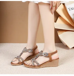 Detailed close-up of Bohemian wedge sandals featuring sparkling rhinestone embellishments