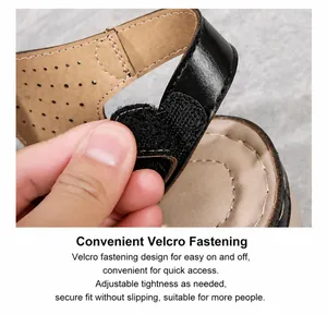 Detail of adjustable hook-and-loop strap on women black leather summer beach sandal