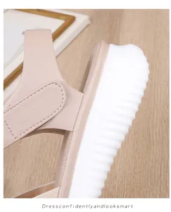 Detailed shot of bohemian beige sandals showing the elastic strap and anti-slip thick sole