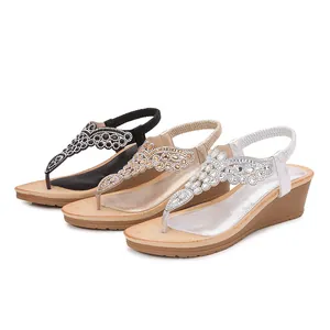 Ladies rhinestone wedge sandals in black, gold, and silver with bohemian T-strap style