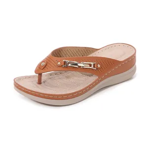 Summer beach flip-flops for women featuring tan faux leather straps and a comfort wedge sole