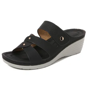 Women's black wedge sandals with multi-strap design and rose gold rivets for summer