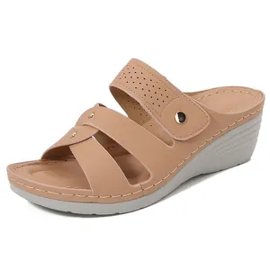Women's casual wedge sandals in beige with multi-strap design and gold buckle detailing