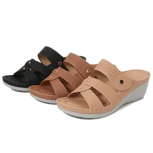 Women's summer platform wedge sandals with studded straps in black brown and beige colors