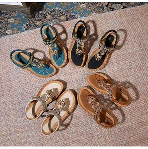 Flat bohemian sandals with T-strap beadwork and elastic back strap in four colors