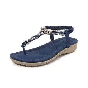 Sandalias bohemias azul oscuro con pedrería y tira elástica para mujer cómoda