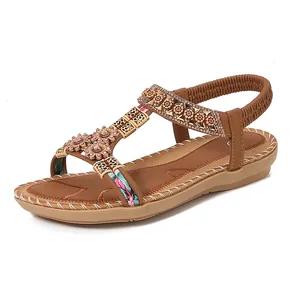 Bohemian bruine platte sandalen voor dames met bloemapplicaties en glanzende strass-steentjes
