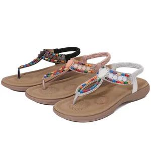 Bohemian flip-flop sandals with rhinestones and colorful beads in black, pink, and silver