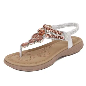 Bohemian flip-flop sandals for women featuring silver rhinestones and shell beads decor