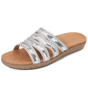 Women's bohemian flat sandals with sparkling silver sequin straps and comfy cushioned soles