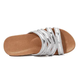 Flat bohemian summer sandals for women with silver sequined straps and soft brown sole
