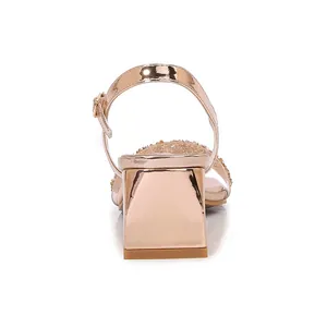 Women's rose gold block heel sandals with rhinestone straps and metallic finish