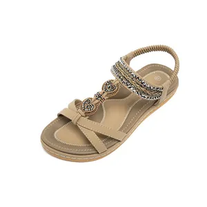 Women's summer flat sandals with rhinestone heart detail and comfortable elastic strap