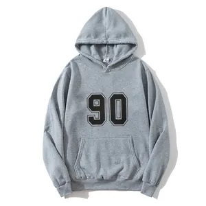 Grey oversized hoodie with printed 90 graphic, kangaroo pocket and drawstring hood
