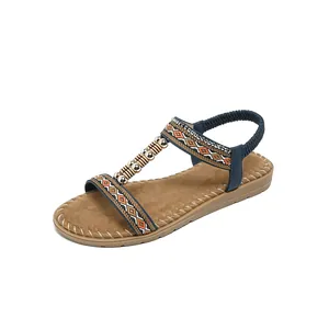 Sandalias planas étnicas con bordados coloridos, cuentas de metal y tira elástica