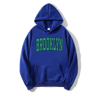 Women's royal blue oversized hoodie with vintage green Brooklyn print and drawstrings