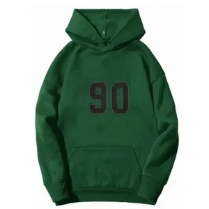 Detail of dark green hoodie featuring bold number 90 print and classic kangaroo pocket
