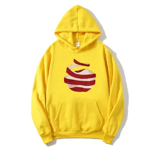 Yellow oversized hoodie with red spiral print and kangaroo pocket on white background