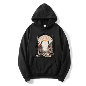 Detail of black hoodie featuring vintage Wild West print with desert graphics and kangaroo pocket
