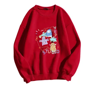 Sweat-shirt rouge en polaire avec imprimé monstre de dessin animé et finitions bord-côte