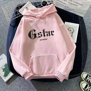 Detail of pink oversized hoodie with gothic lettering and classic kangaroo pocket