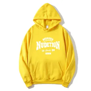Detail of yellow fleece hoodie with white graphic print and classic kangaroo pocket