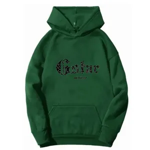 Detail of Gothic Gstar print on dark green oversized fleece hoodie with drawstring hood