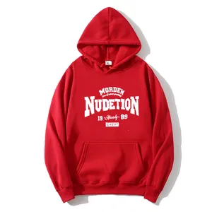 Close-up of red hoodie featuring white vintage letter print and kangaroo pocket detail